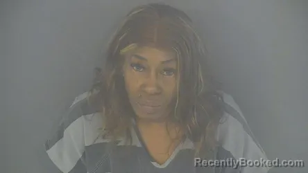 Mugshot of TANISHA CHERIE REEVES-DIXON
