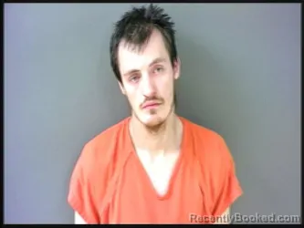 Mugshot of OZZY ARRON WALLIN booked in Starke County, Indiana on April 23, 2026