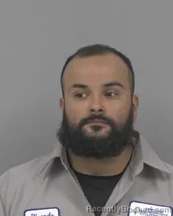 Mugshot of Ricardo Fidel Ames booked in Johnston County, North Carolina on October 21, 2026