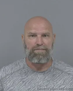 Mugshot of John Louis Dusek booked in Johnston County, North Carolina on August 13, 2026