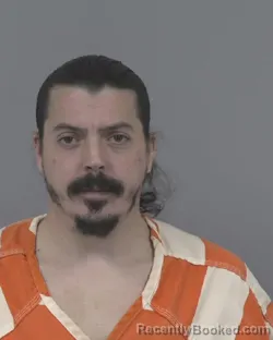 Mugshot of MALCOM CLIFFORD DOWNS