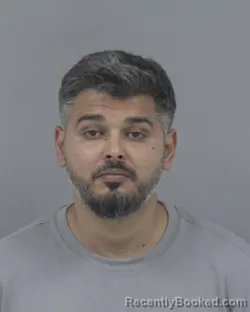 Mugshot of MOUSA AL HILEH booked in Johnston County, North Carolina on July 12, 2026