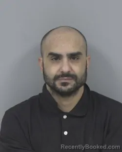 Mugshot of SHAWQI AL HUTHAIFI booked in Johnston County, North Carolina on April 7, 2026