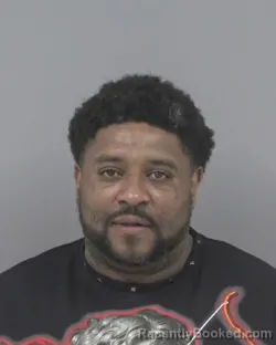 Mugshot of Alex Dontez Kearney booked in Johnston County, North Carolina on October 13, 2026