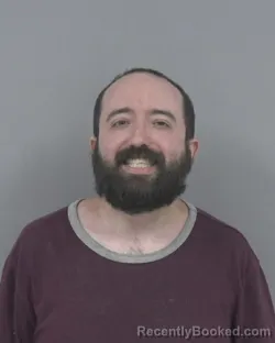 Mugshot of ALEC MARTINO-MARTINZ KNIPE booked in Johnston County, North Carolina on August 3, 2026