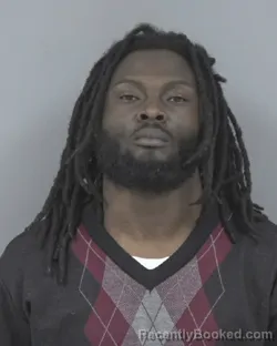 Mugshot of KELVIN CORNELIUS LOMAX