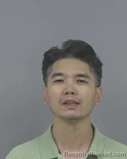 Mugshot of Yang Li booked in Johnston County, North Carolina on August 8, 2026