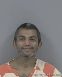 Mugshot of ISIDORO FLORES MOLINA