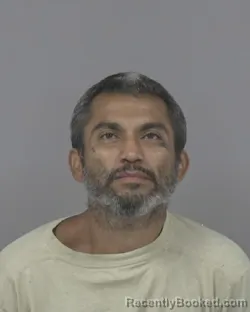 Mugshot of Isidoro Flores Molina booked in Johnston County, North Carolina on October 14, 2026