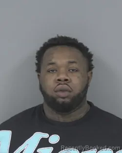 Mugshot of ROME DAYSHAWN MOORE booked in Johnston County, North Carolina on March 21, 2026