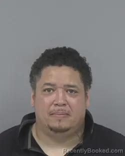 Mugshot of RAYMOND JAMES MERCADO booked in Johnston County, North Carolina on March 12, 2026