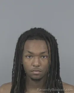 Mugshot of TRAVIS LAMONT MANGUM booked in Johnston County, North Carolina on March 26, 2026