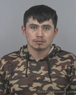 Mugshot of NORVI OSVANI PEREZ-TRIGUEROS