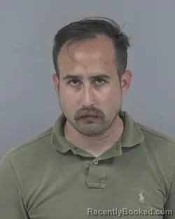 Mugshot of CHRISTOPHER MICHEAL RENAUD booked in Johnston County, North Carolina on July 6, 2026
