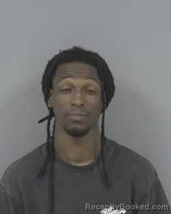 Mugshot of DAVION LAMONT RISER booked in Johnston County, North Carolina on May 18, 2026