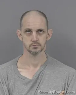 Mugshot of JUSTUS LARSON REID booked in Johnston County, North Carolina on March 10, 2026