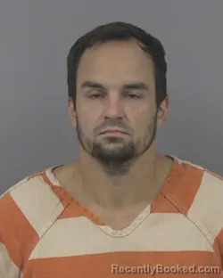 Mugshot of Zachary Joseph Sims booked in Johnston County, North Carolina on October 14, 2026
