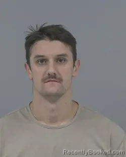 Mugshot of Nicholas Phillip Burnes Thompson booked in Johnston County, North Carolina on September 25, 2026