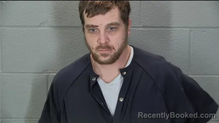 Mugshot of Justin Michael Maxwell