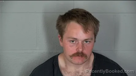 Mugshot of Carter Gene Settles