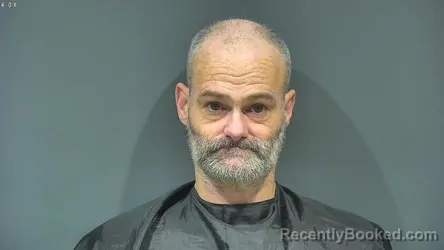 Mugshot of RICHARD M WOODS