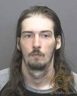 Mugshot of AUSTIN DOUGLAS MOORE booked in Vanderburgh County, Indiana on June 12, 2026