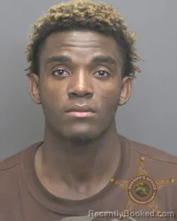 Mugshot of MIGUEL ANGEL CHARLES