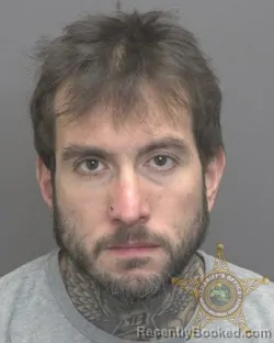 Mugshot of AARON JORGE QUIROZ