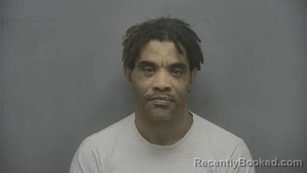 Mugshot of Cecil Leon Evans