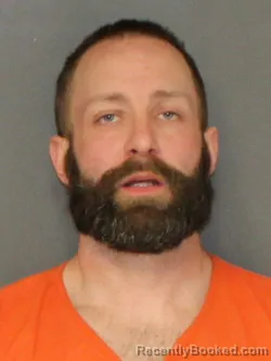 Mugshot of JUSTIN ROSS ASH booked in Warrick County, Indiana on March 30, 2026