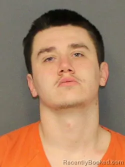 Mugshot of HUNTER AUSTIN HELMICK