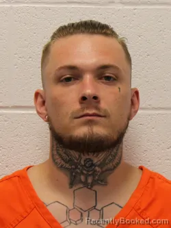 Mugshot of Adam Joseph Russell booked in Warrick County, Indiana on August 18, 2026