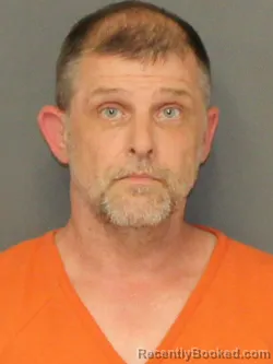 Mugshot of NEIL JAMES SMITH booked in Warrick County, Indiana on May 13, 2026
