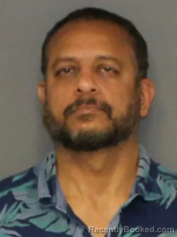 Mugshot of MADHUKAR VELIDE booked in Warrick County, Indiana on May 9, 2026