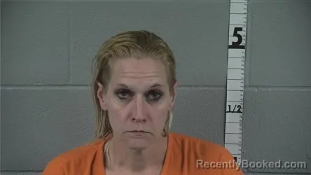 Mugshot of MAGGIE IRENE REYNOLDS