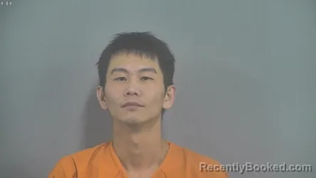 Mugshot of JUNJUN ZHENG