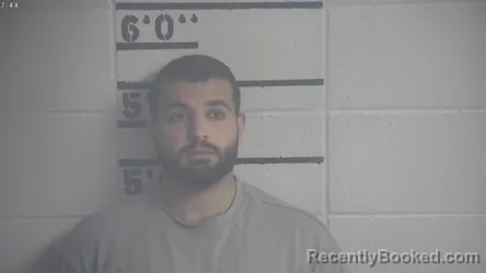Mugshot of MOHAMED AKRAM KHALDI booked in Adair County, Kentucky on June 24, 2026