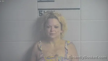 Mugshot of Amberly Nichole Champion booked in Adair County, Kentucky on August 26, 2026