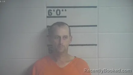 Mugshot of KENNY J DOTSON