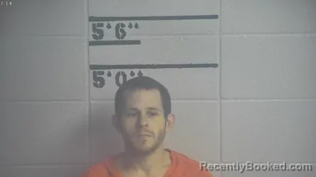 Mugshot of RYAN M SNEED