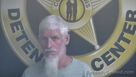 Mugshot of DANNY GIVINS booked in Bell County, Kentucky on April 10, 2026