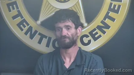 Mugshot of MATTHEW W RANEY