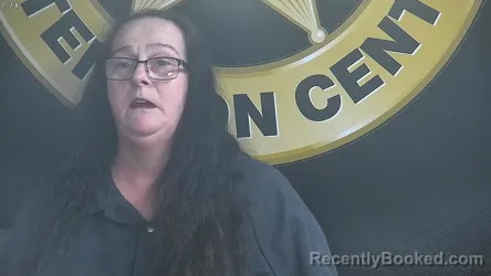 Mugshot of NORMA HERRON booked in Bell County, Kentucky on April 22, 2026