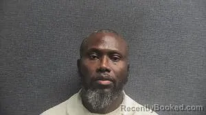 Mugshot of AJIBOLA ODUNTAN booked in Boone County, Kentucky on March 13, 2026