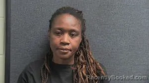 Mugshot of NADINE NYANGI booked in Boone County, Kentucky on March 31, 2026