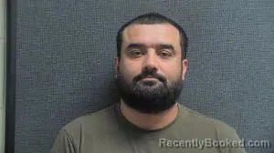 Mugshot of AZAM ISMOILOV booked in Boone County, Kentucky on April 1, 2026