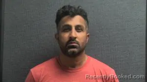 Mugshot of FARHAN MUHAMMAD KHOKHAR booked in Boone County, Kentucky on May 18, 2026