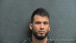 Mugshot of RONY ALEXANDER GOMES FLORES booked in Boone County, Kentucky on June 9, 2026