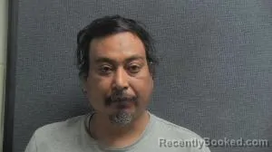 Mugshot of JUAN MANUEL GALAN ALVARADO booked in Boone County, Kentucky on June 14, 2026
