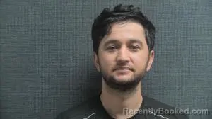 Mugshot of Shakbosbek Khudaiberbiev booked in Boone County, Kentucky on August 15, 2026
